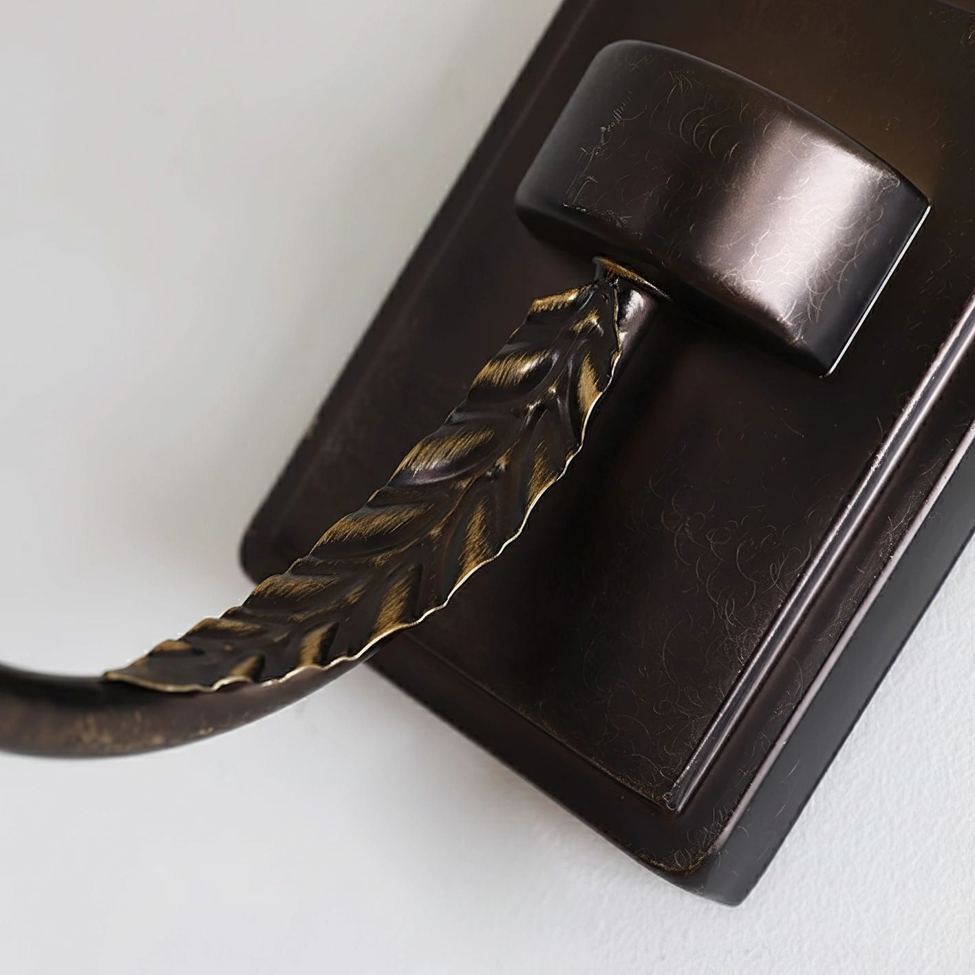 Wall sconce installation example showing Art Deco design in contemporary home decor setting