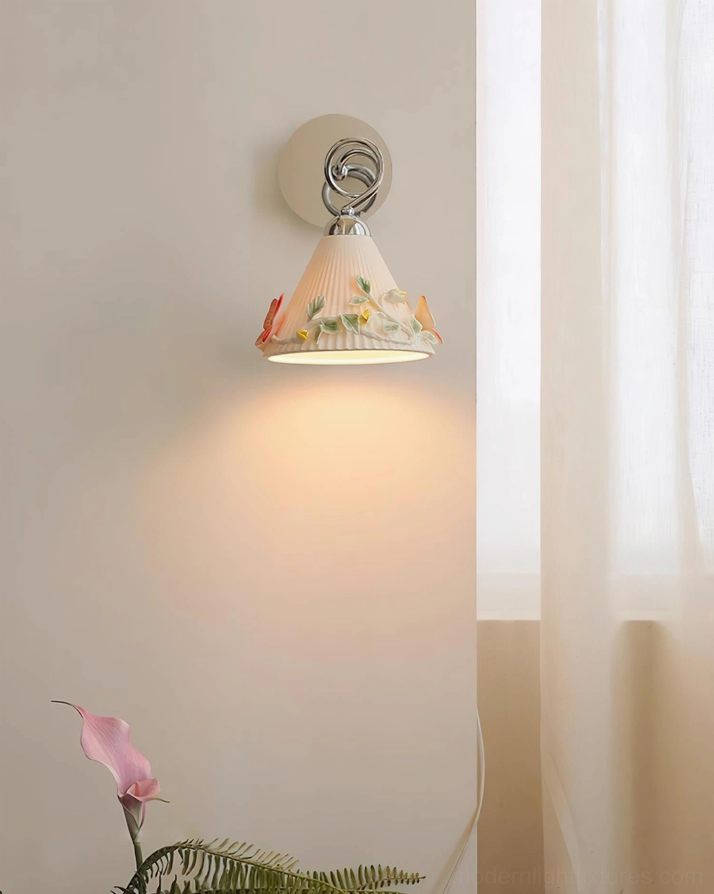 Ceramic butterfly wall sconce in cozy home corner casting soft warm diffused light, subtle embossed floral details on pleated ceramic surface