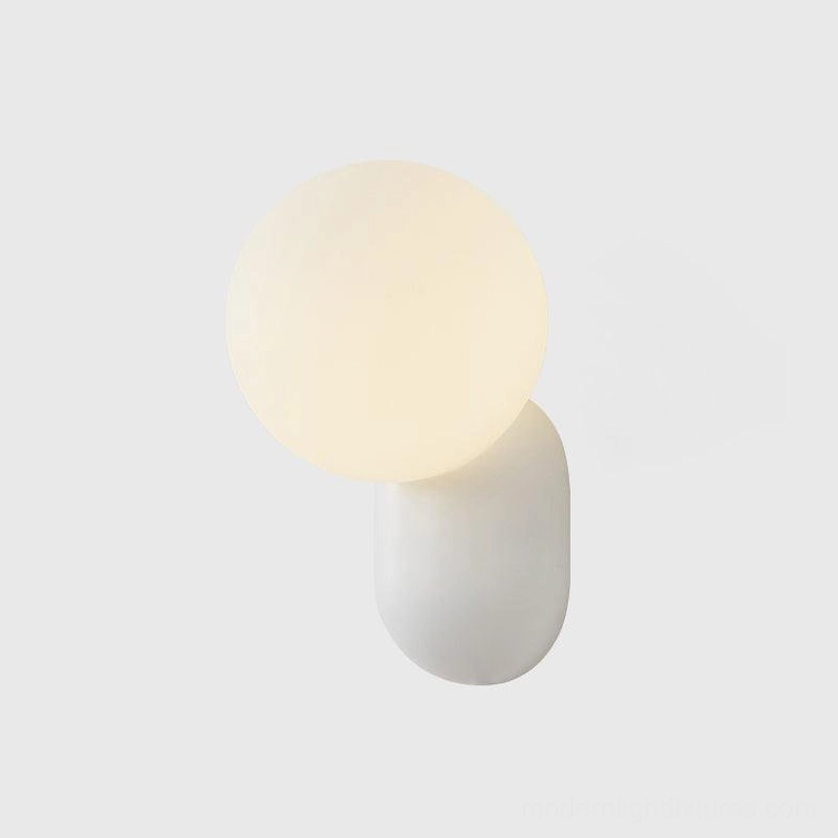 Spherical wall sconce in various color options - pink, black, white, and gray finish palette display