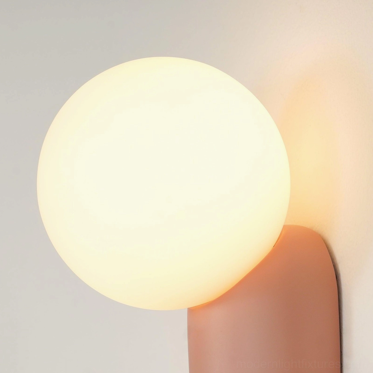 Wall sconce suitable for entryways and gallery-style arrangements as individual design statement piece