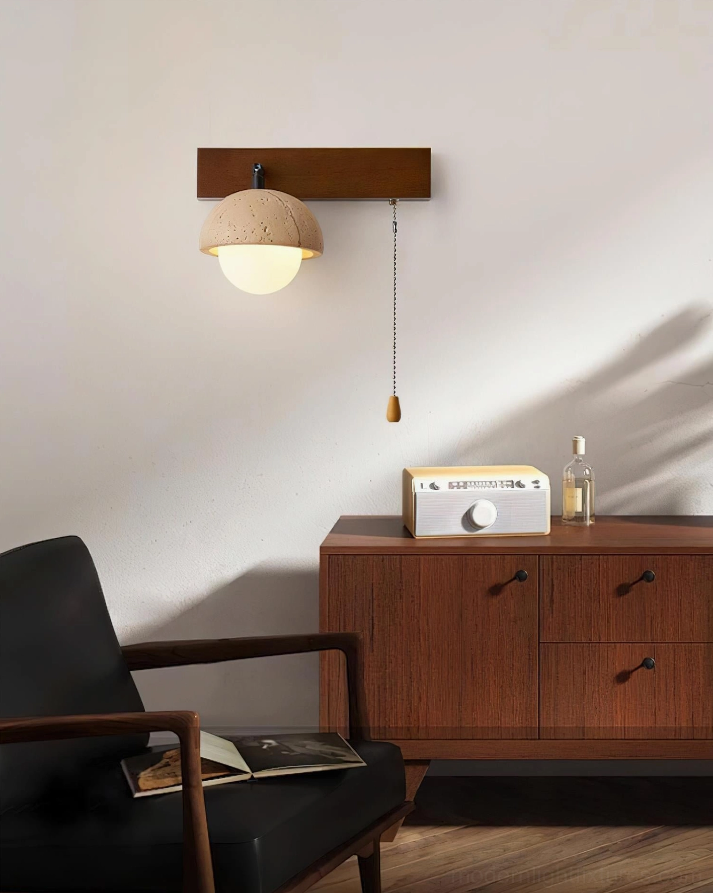 Mid-century modern wall lamp mounted above wooden cabinet in contemporary lounge area