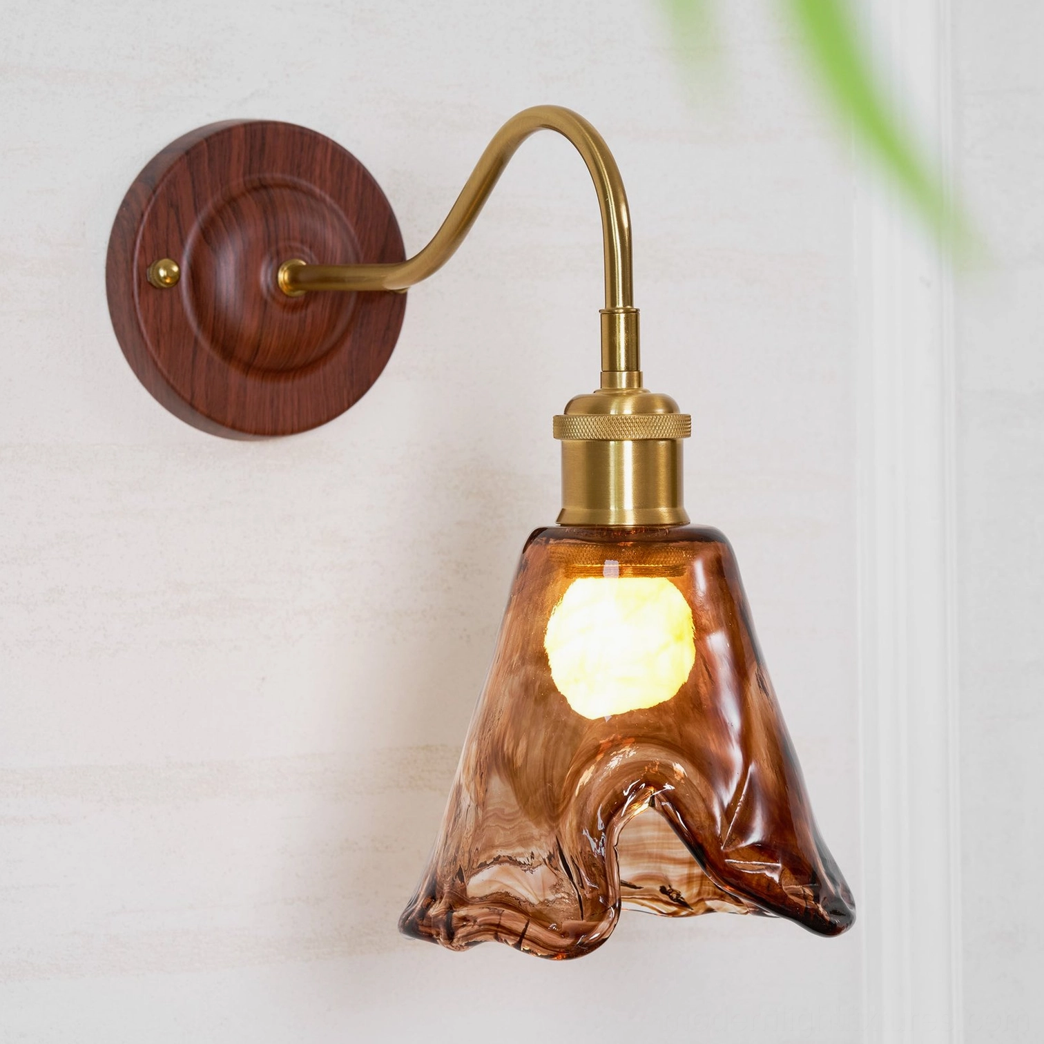 Nalia amber wall lamp three-light arrangement showing versatility for multiple room installations