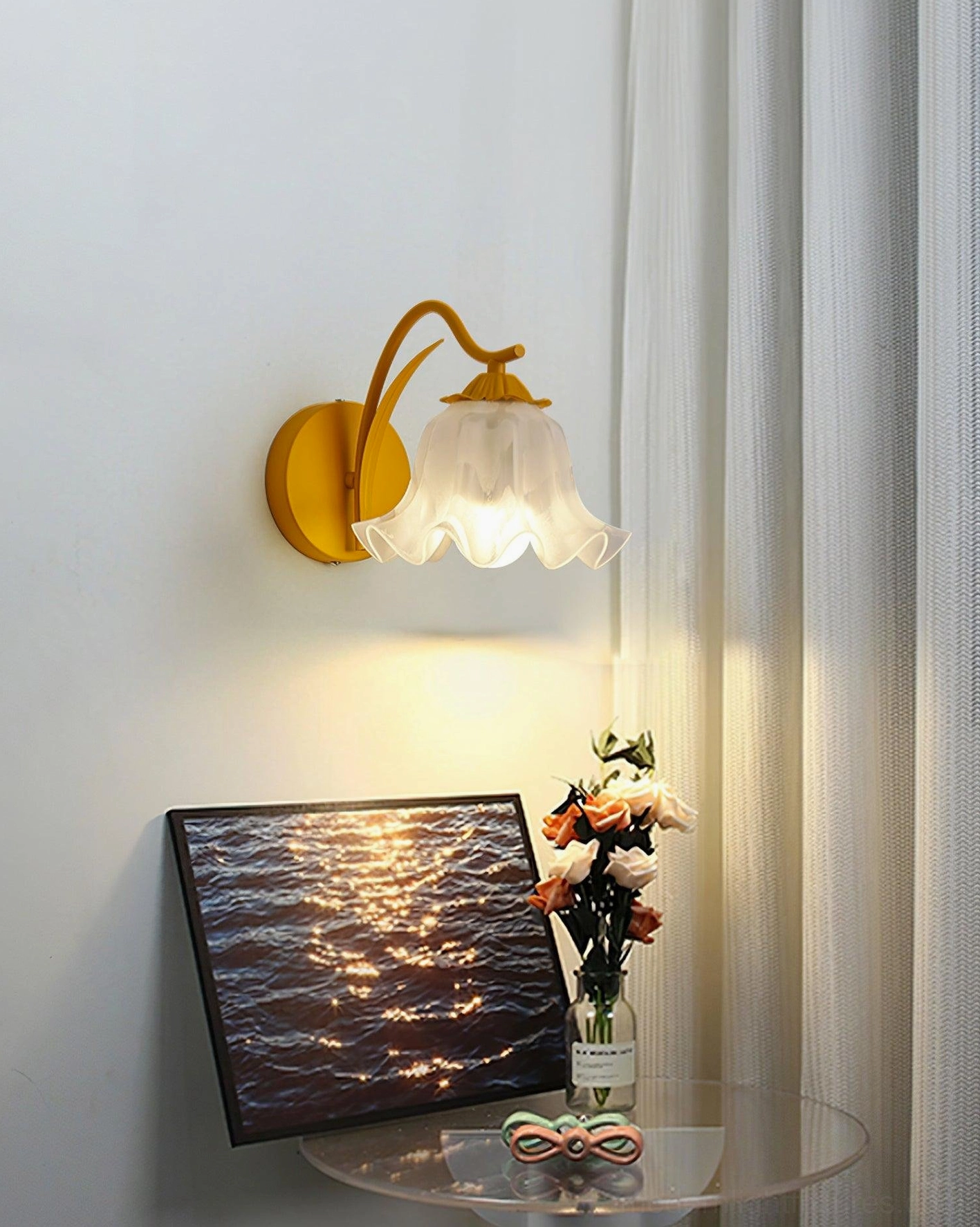 Frosted acrylic floral shade detail of contemporary lily valley wall light