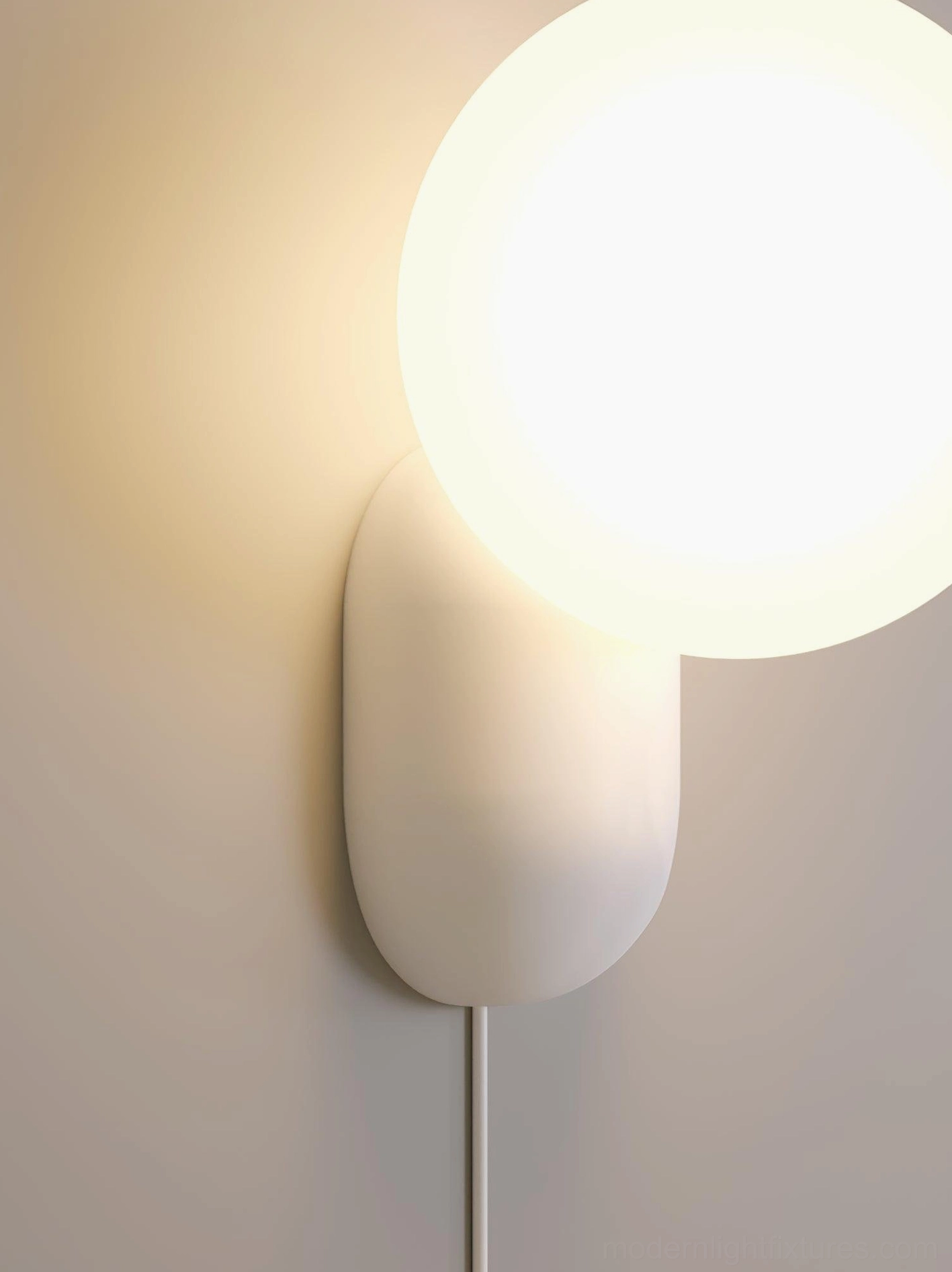 Wall sconce providing accent illumination in transitional interior design with mixed style elements