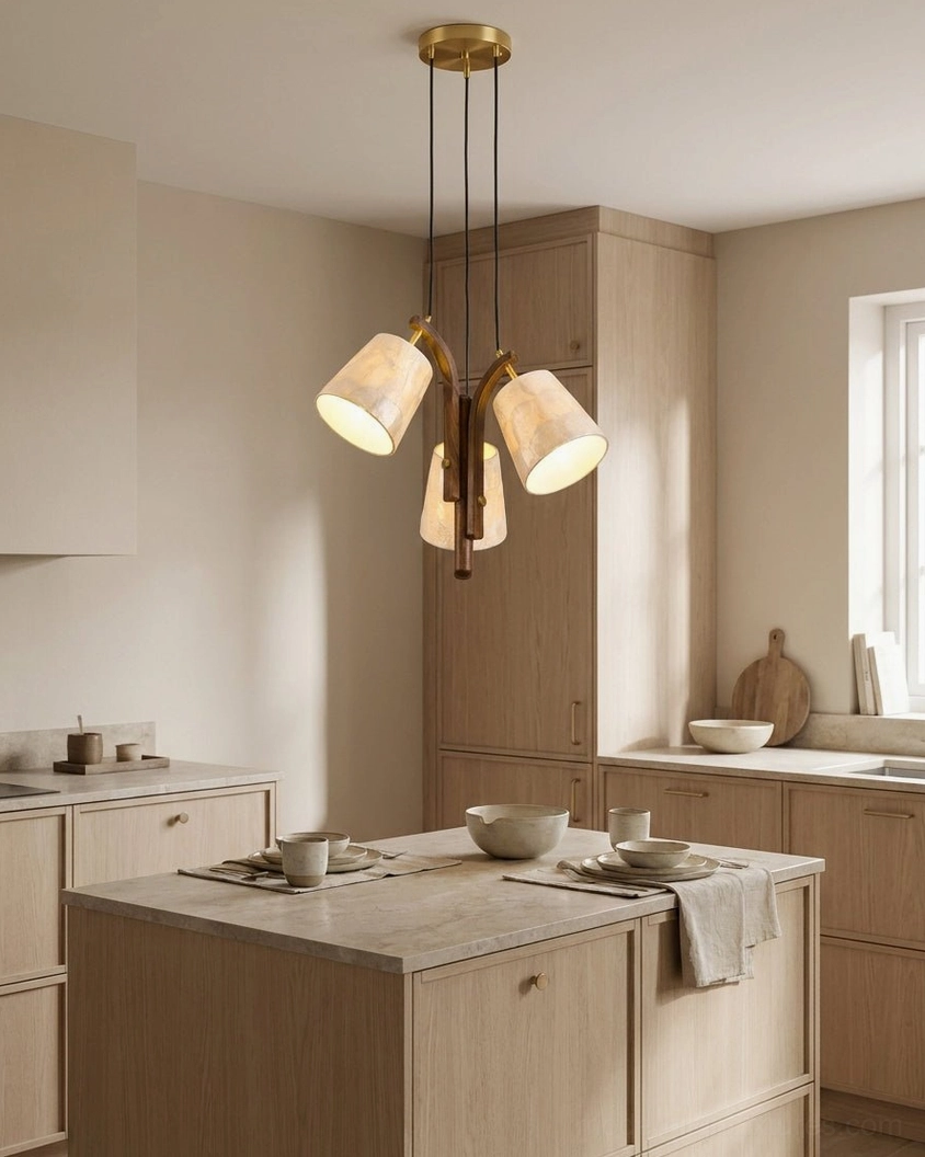 Walmere capiz shell pendant suspended over kitchen island with light wood cabinetry and clean modern kitchen design