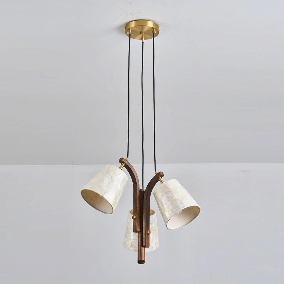 Walmere capiz shell pendant light with walnut wood support and staggered height shades, studio photography