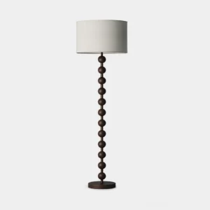 Dark walnut barbell wood floor lamp full body view with cream fabric shade in studio lighting