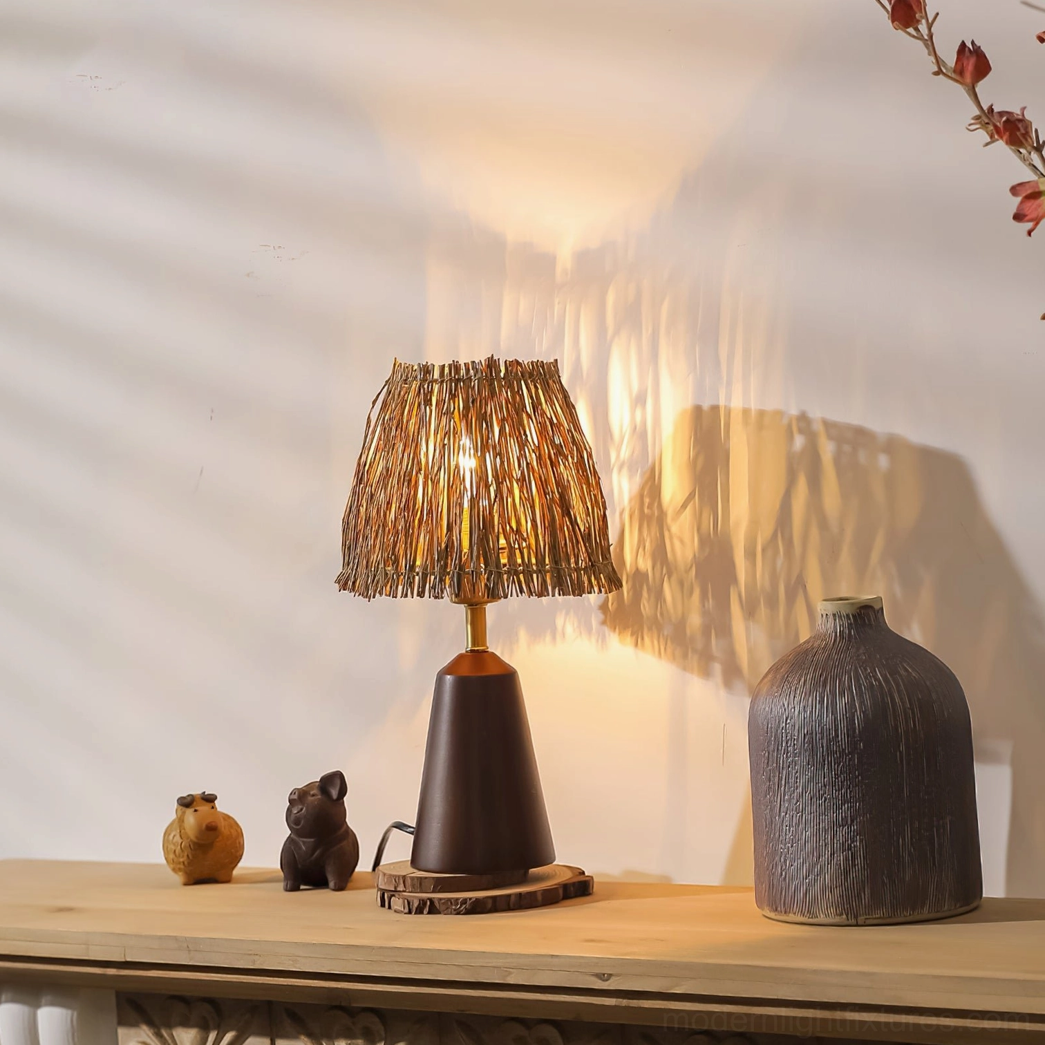 Walnut-colored bohemian woven table lamp with ambient warm lighting and ceramic decor