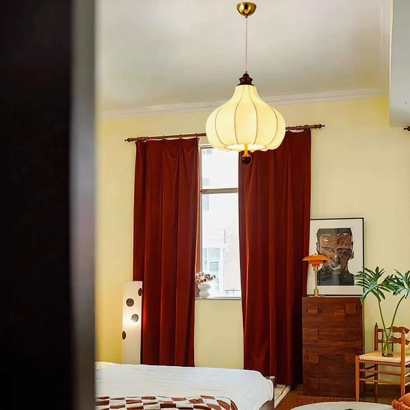 Walnut color botanical pendant lamp variant displayed in interior setting with warm lighting