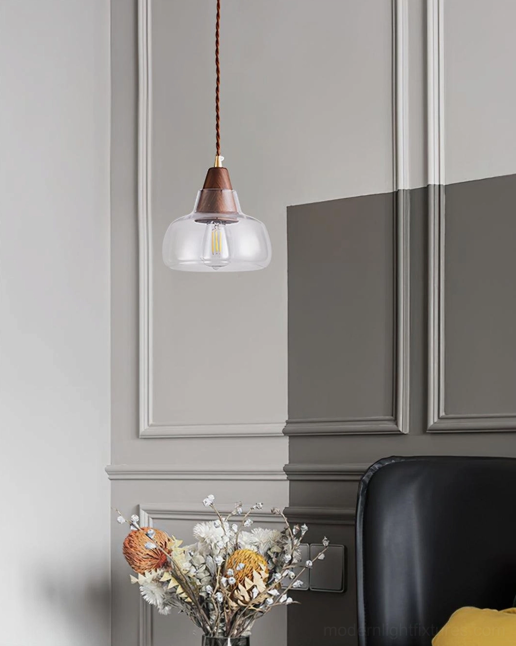 Walnut and brass glass pendant light fixture showcasing warm wood grain and crystalline glass design, modern pendant shade