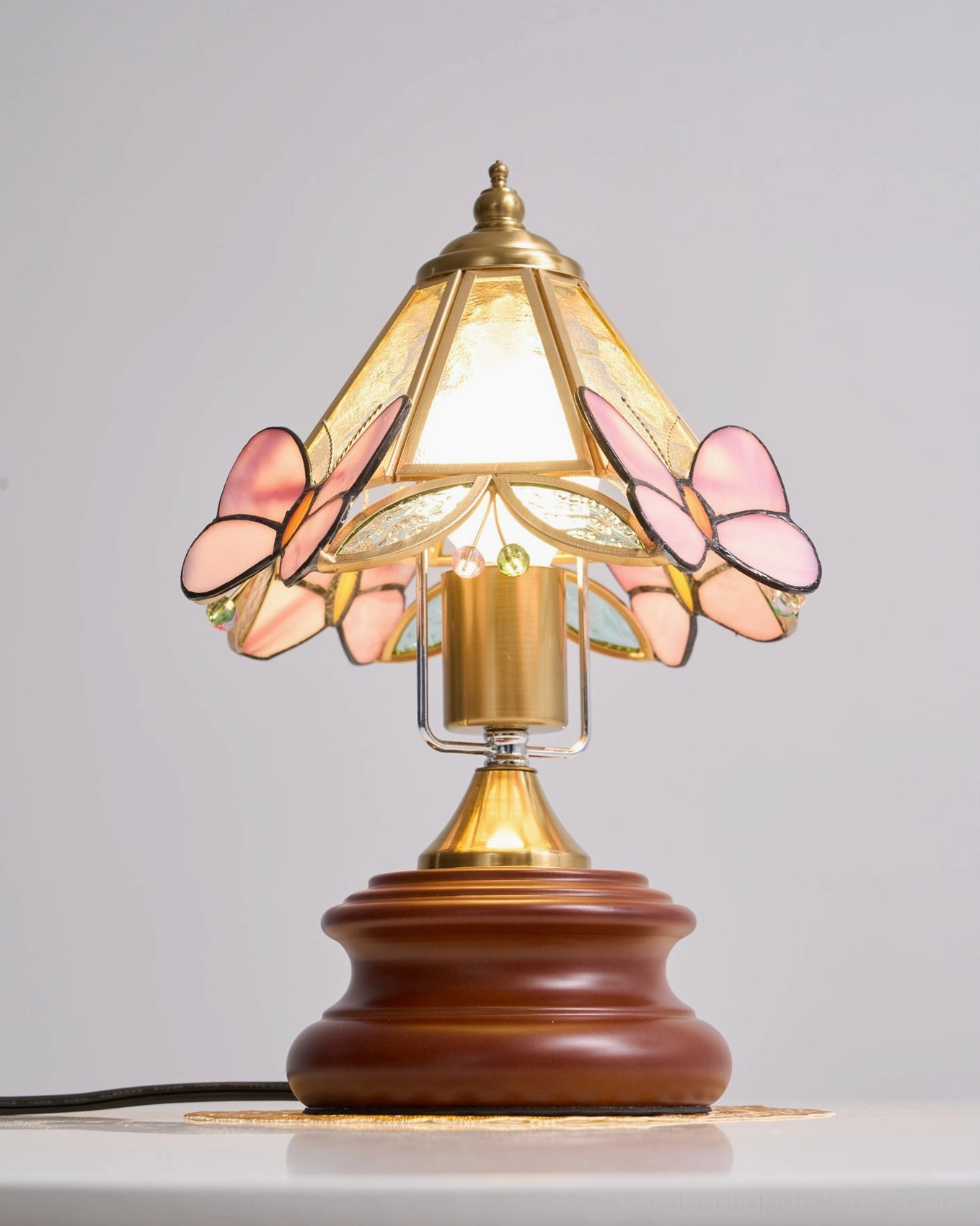Stained glass butterfly table lamp walnut wood base and brass hardware detail shot