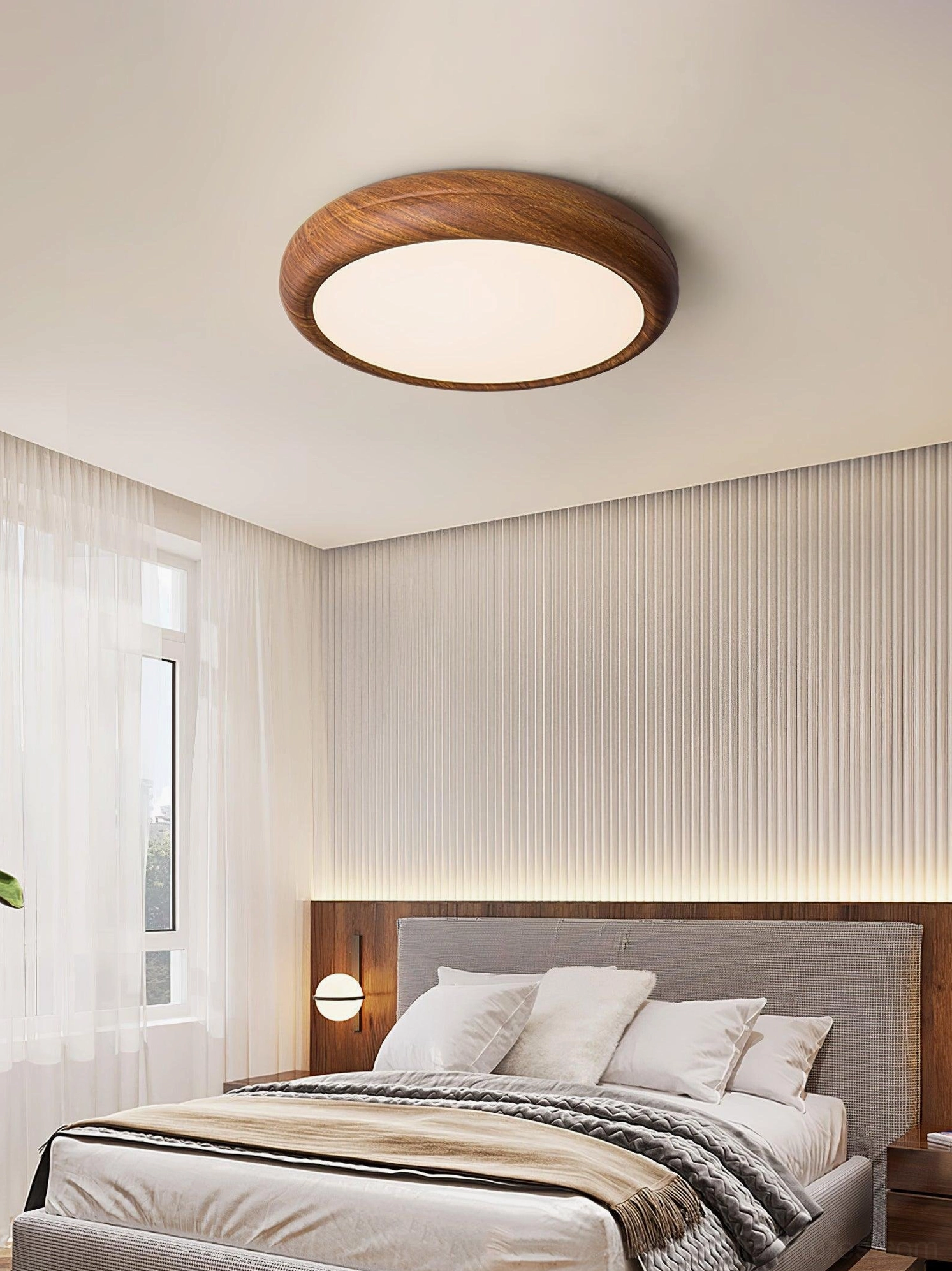 Walnut wood grain round ceiling light creating warm residential ambiance in modern home interior