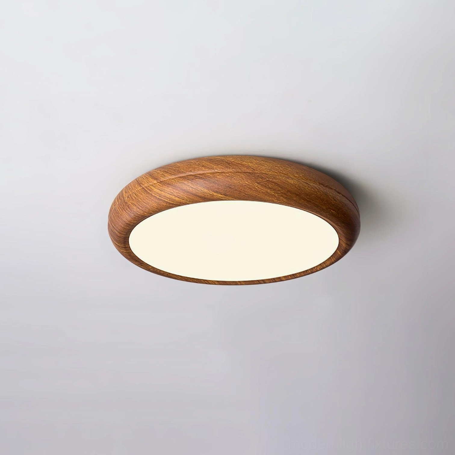 Walnut wood grain ceiling light fixture demonstrating even 3000K warm white light distribution across room