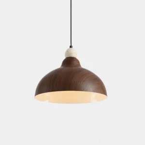 Walnut wood grain metal dome pendant light with travertine stone accent, overhead studio view