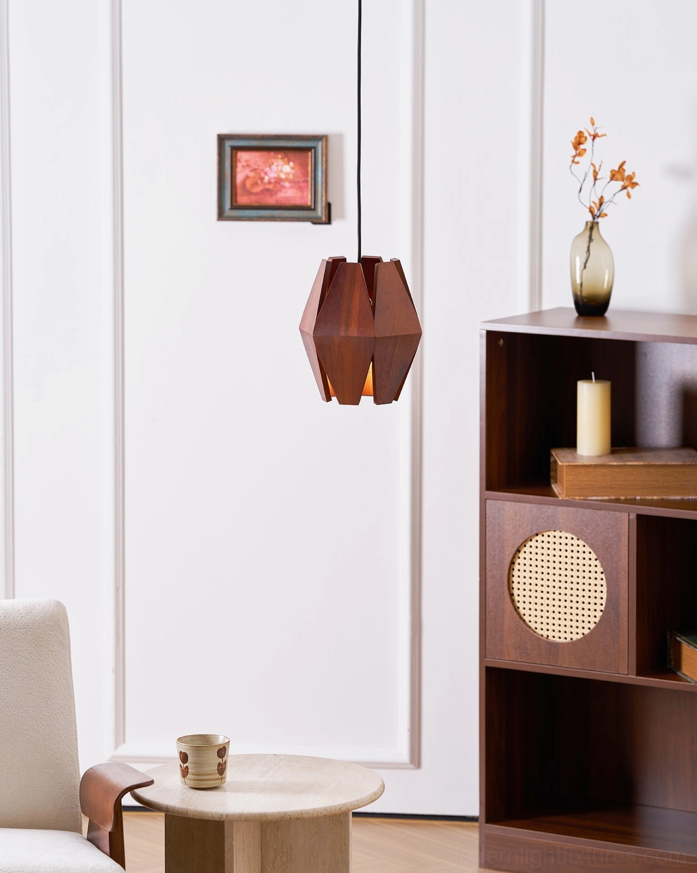 Walnut polygon pendant lamp suspended in contemporary interior space with architectural details