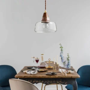 Walnut glass pendant lamp overhead top view on vintage dining table, Nordic pendant lighting in rustic setting