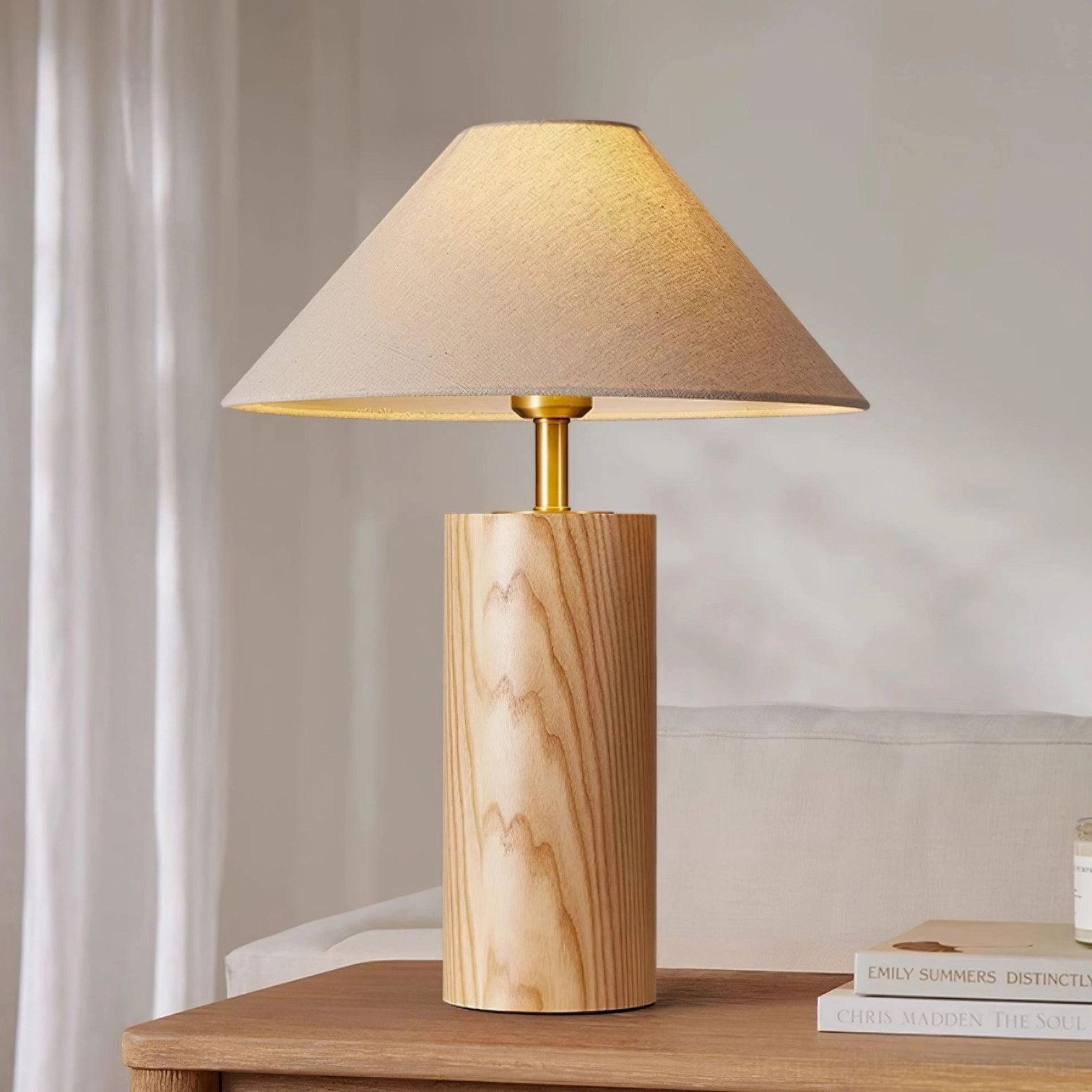 Walnut finish table lamp as reading light beside comfortable seating in living room lounge
