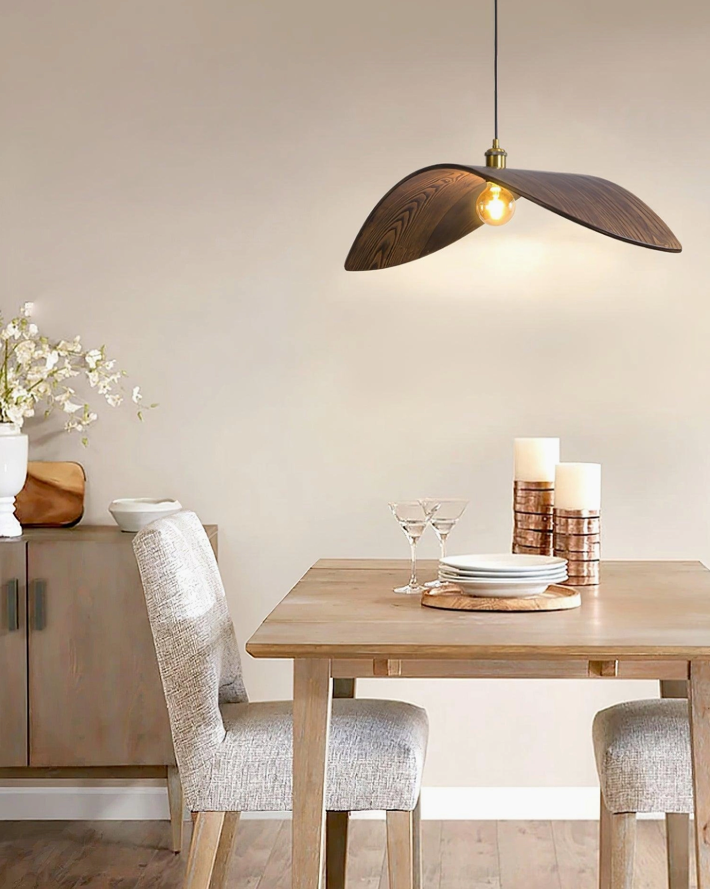 Walnut wood leaf pendant lamp showcasing organic sculptural form and minimalist modern design aesthetic
