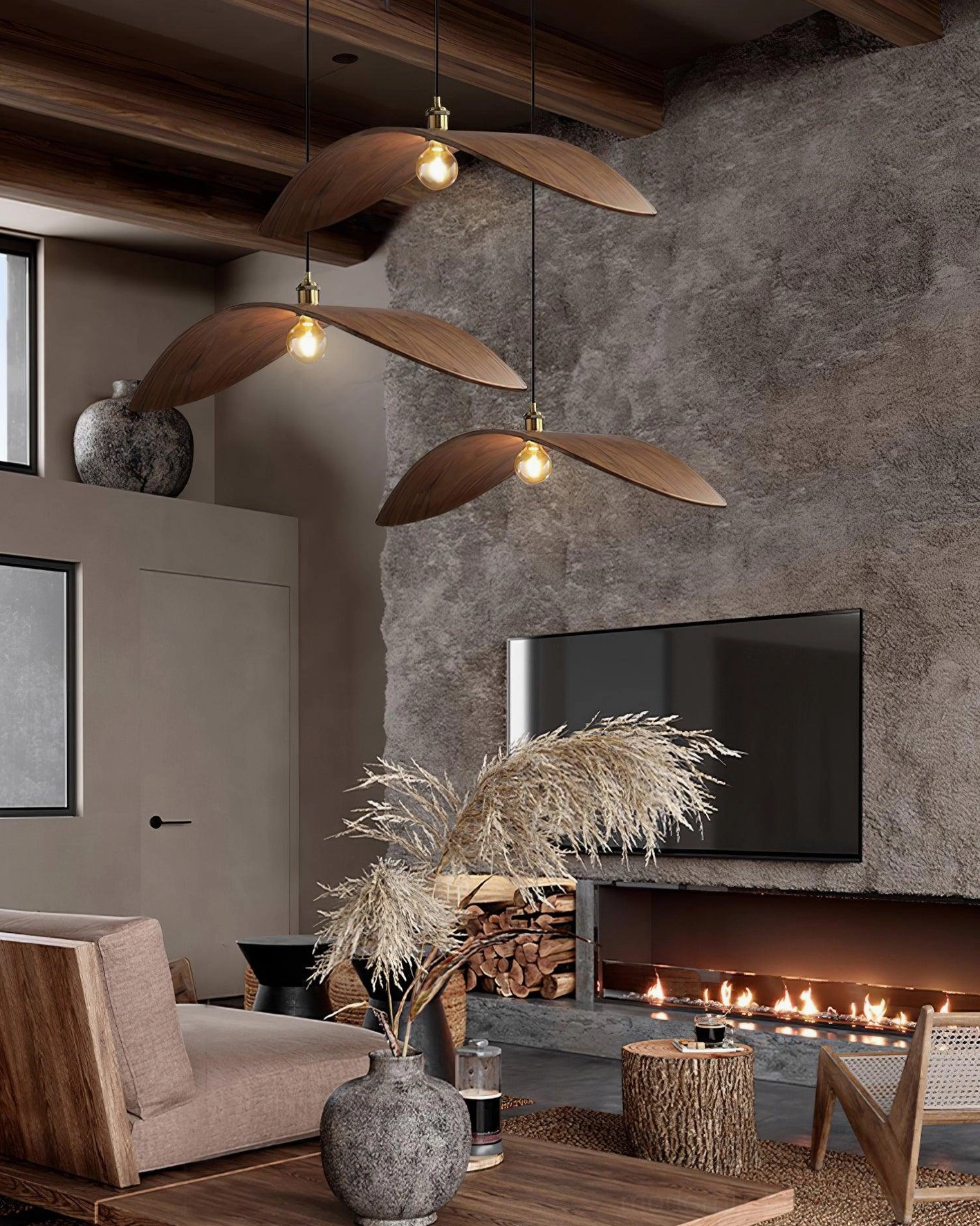 Multiple walnut wood leaf pendant lamps in modern rustic farmhouse living room with cozy warm wood decor and matching ceiling fixtures