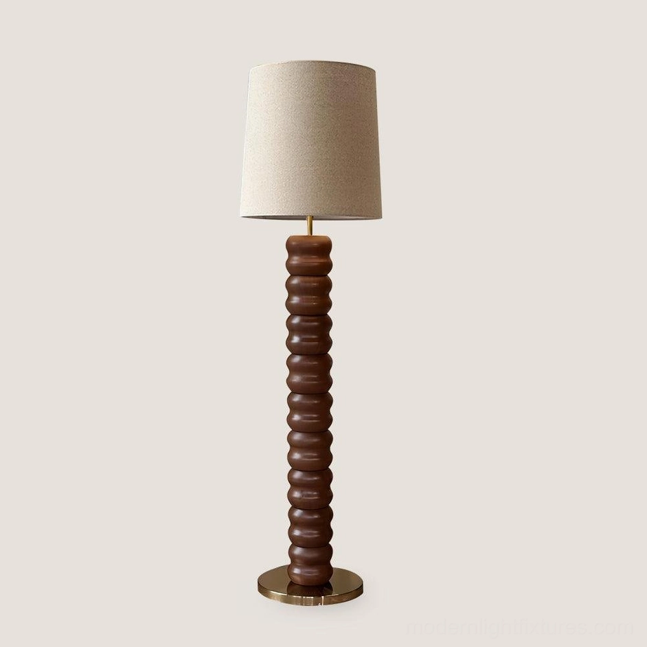 Walnut stacked wood floor lamp architectural lighting piece with brass base and fabric diffuser
