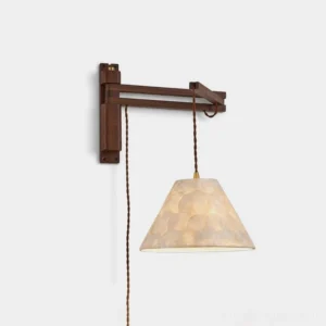 Walnut swing-arm wall sconce with hand-laid Capiz shell shade, conical model, front view on white background