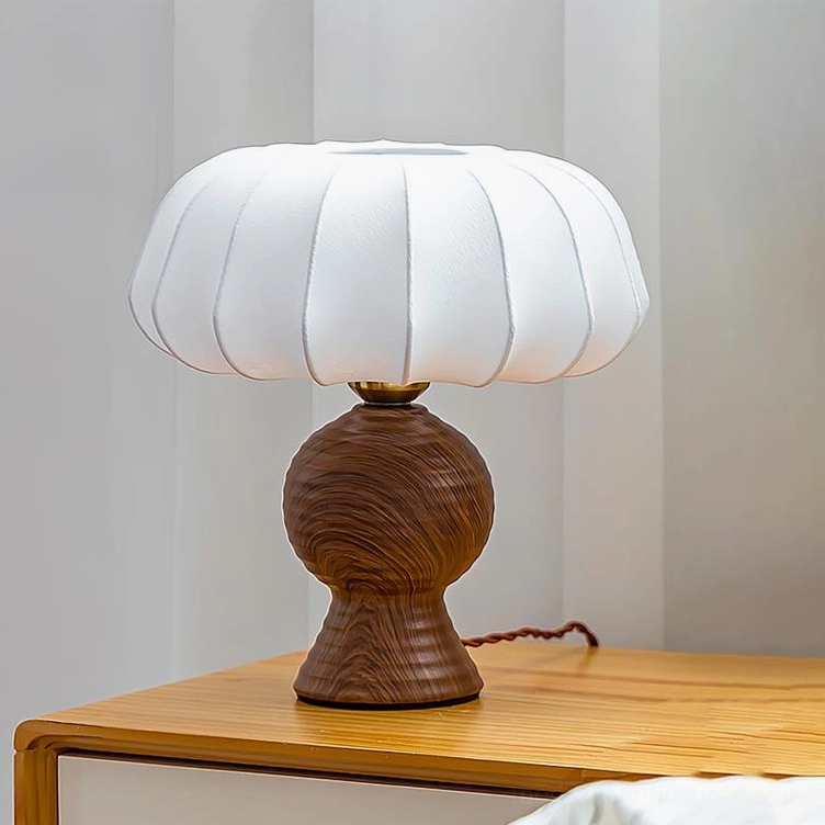 Walnut table lamp with pleated fabric shade bedroom bedside table warm glowing light
