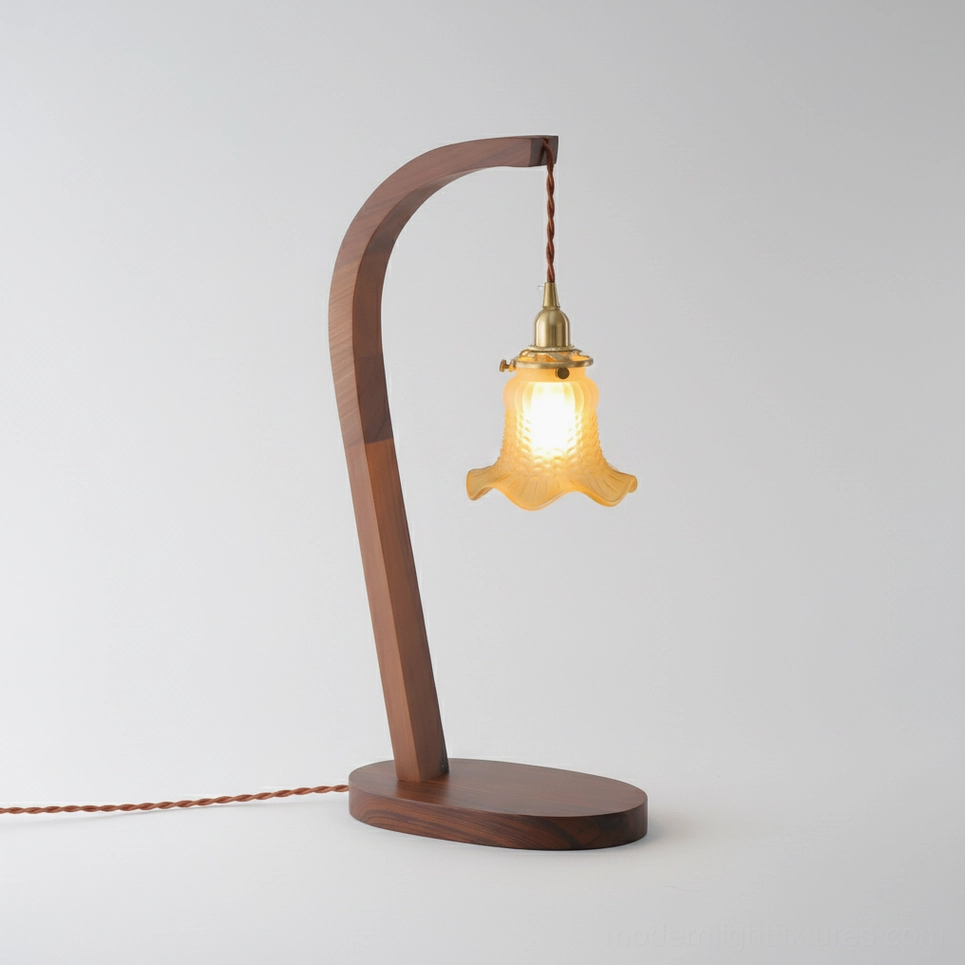 Wooden table lamp with twisted fabric power cord, side profile detail shot