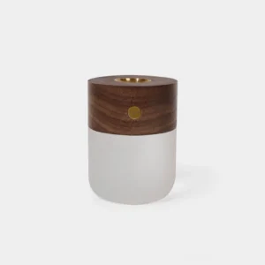 Walnut wood and frosted white aroma diffuser lamp with integrated LED light, front studio view showing minimalist cylindrical design