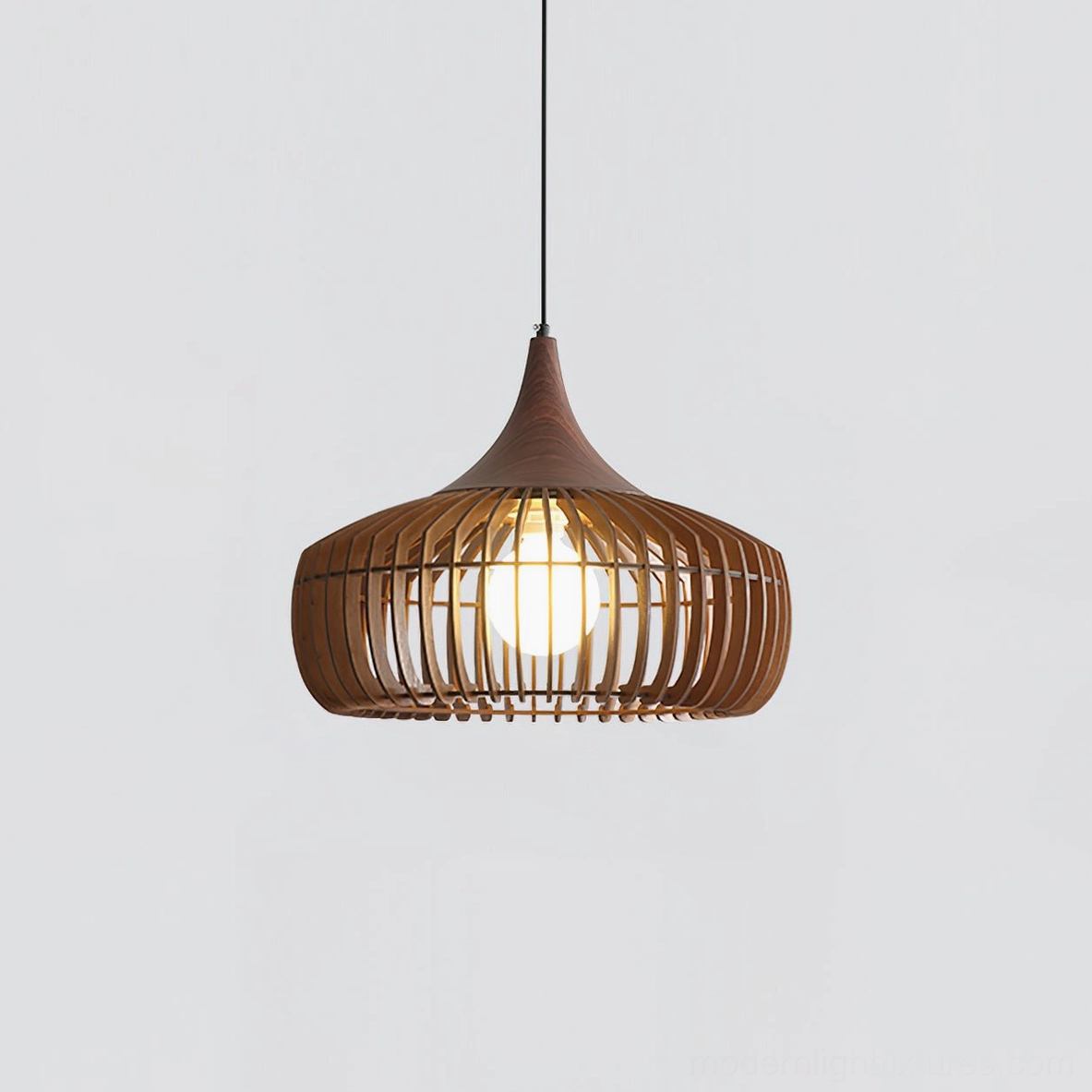 Deep walnut wood cage pendant light with glowing warm bulb, contemporary dark wood finish