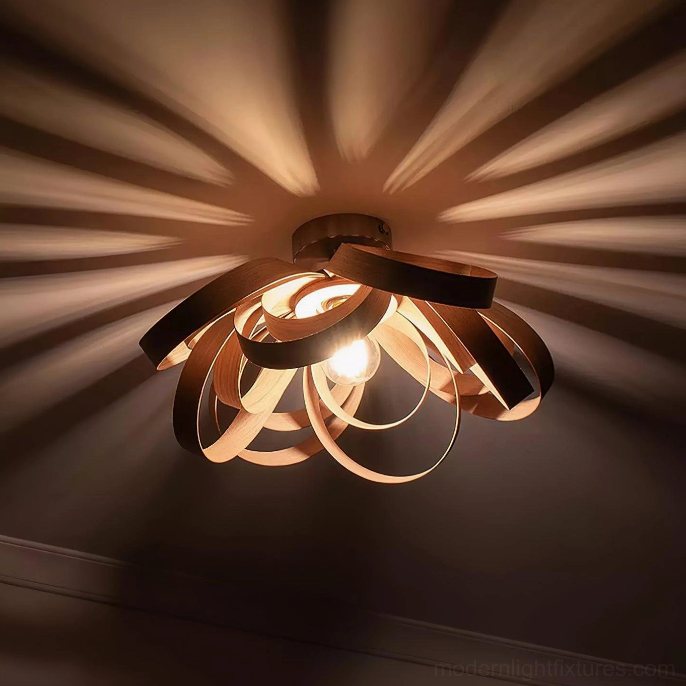 Walnut color wooden petal ceiling light warm ambient glow