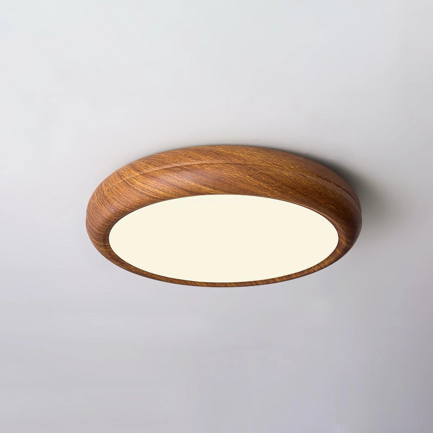 Walnut wood grain ceiling light fixture showing material warmth and natural finish, design-forward lighting