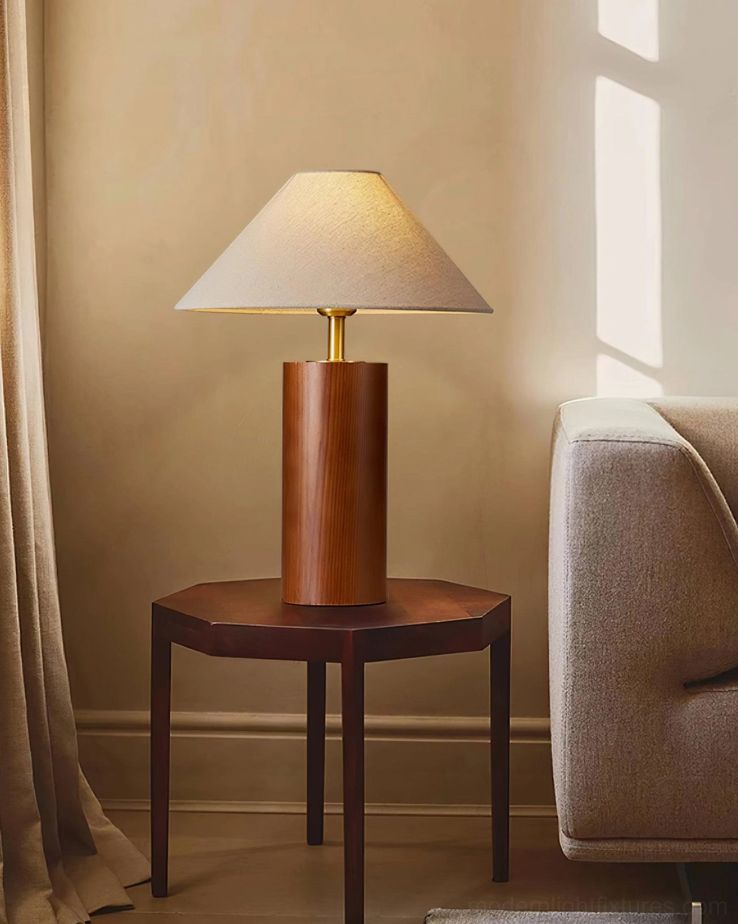 Walnut wood table lamp beside dark side table in modern living room interior design