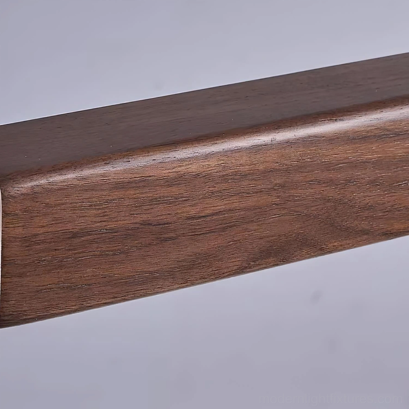 Walnut wood linear pendant light fixture showcasing warm natural finish and sleek minimalist profile design