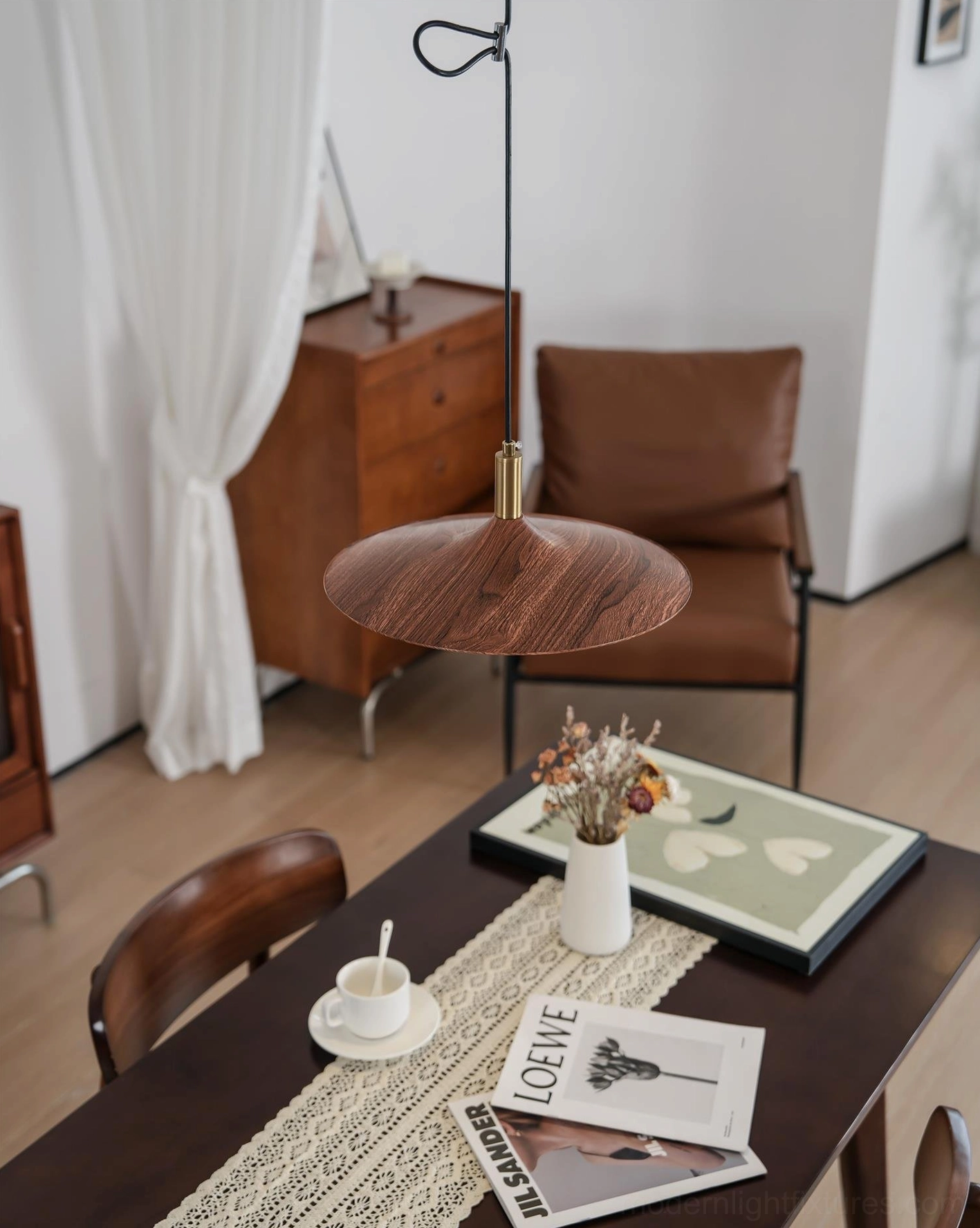 Walnut wood pendant light shade showing organic grain pattern and warm color tone
