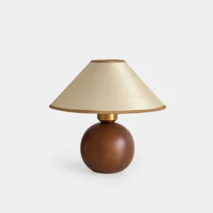 Walnut wood table lamp with tapered beige hemp shade, front view on white background, mid-century modern lighting design