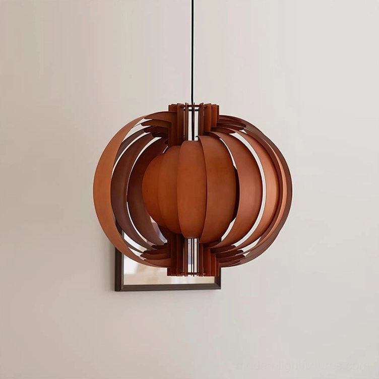 Walnut colored wooden spherical lantern pendant lamp detail view, three-quarter angle with wall art backdrop