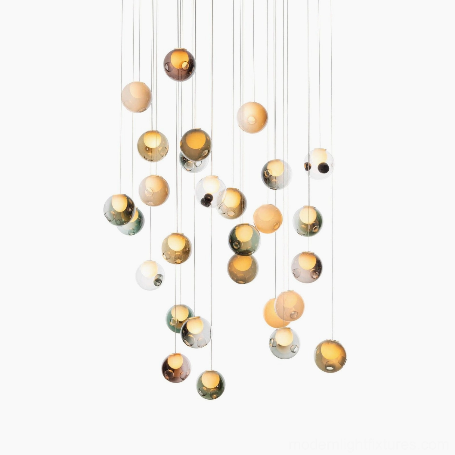 Warm amber-toned hand-blown glass globe cluster chandelier with gradient warm translucent orbs, modern minimalist design