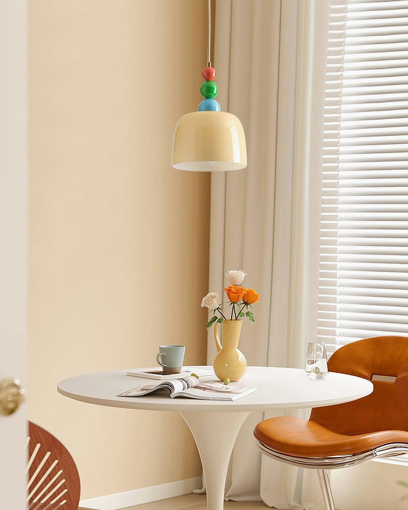 Warm ambient beaded pendant lamp creating cozy focal point in residential space