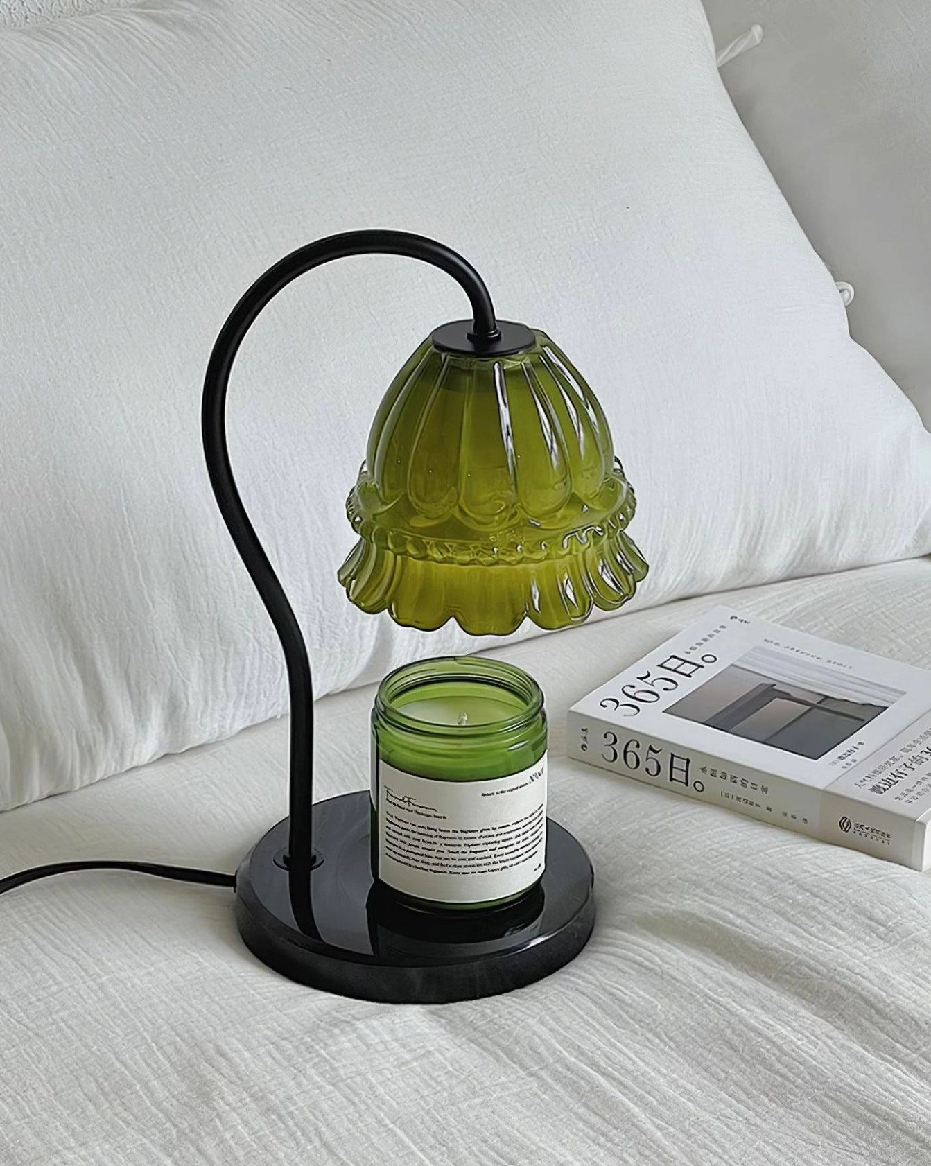 Modern candle warmer lamp with warm ambient light and gentle fragrance release