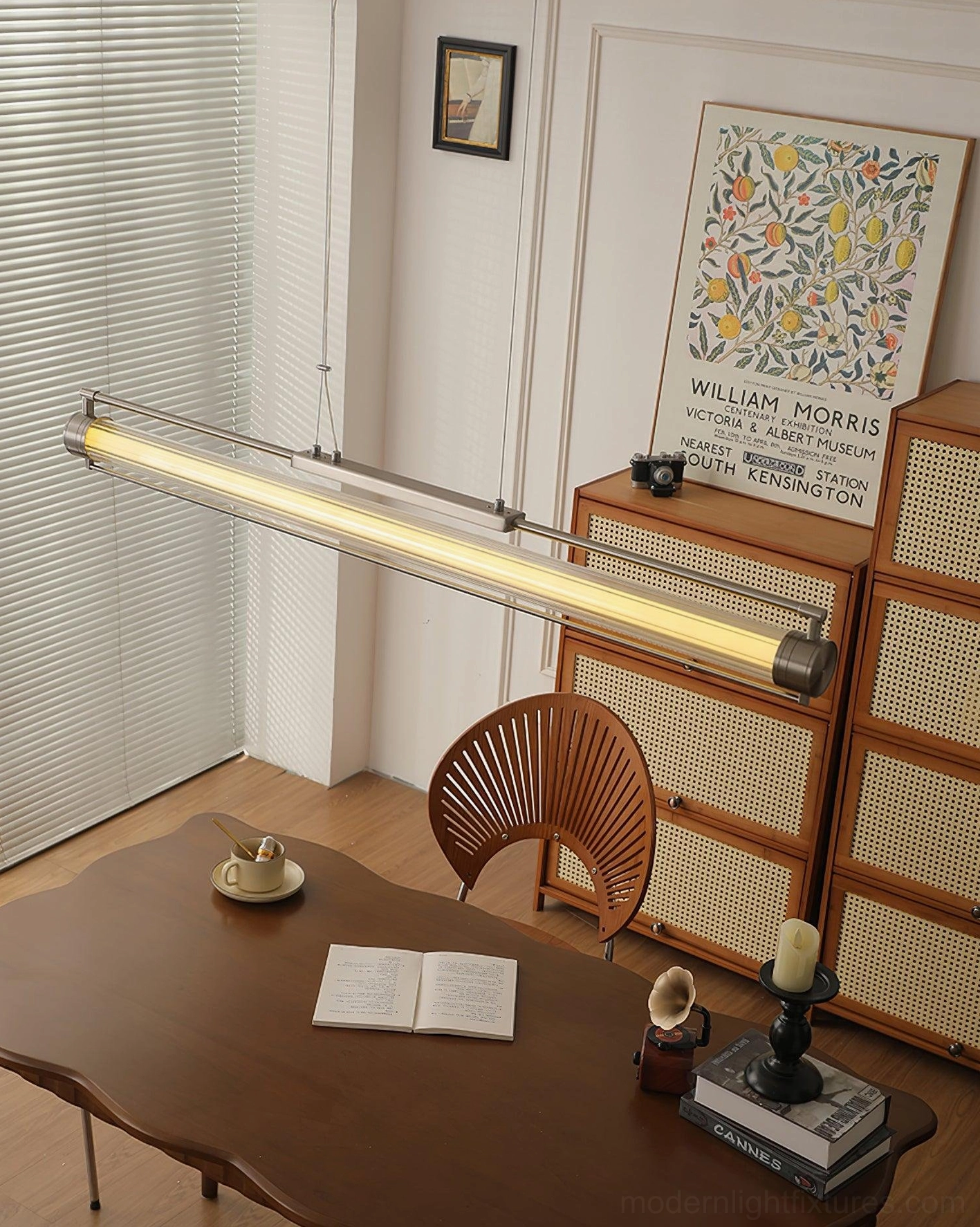 Illuminated linear LED pendant light in vintage-inspired dining space - warm tubular lighting with minimalist aesthetic