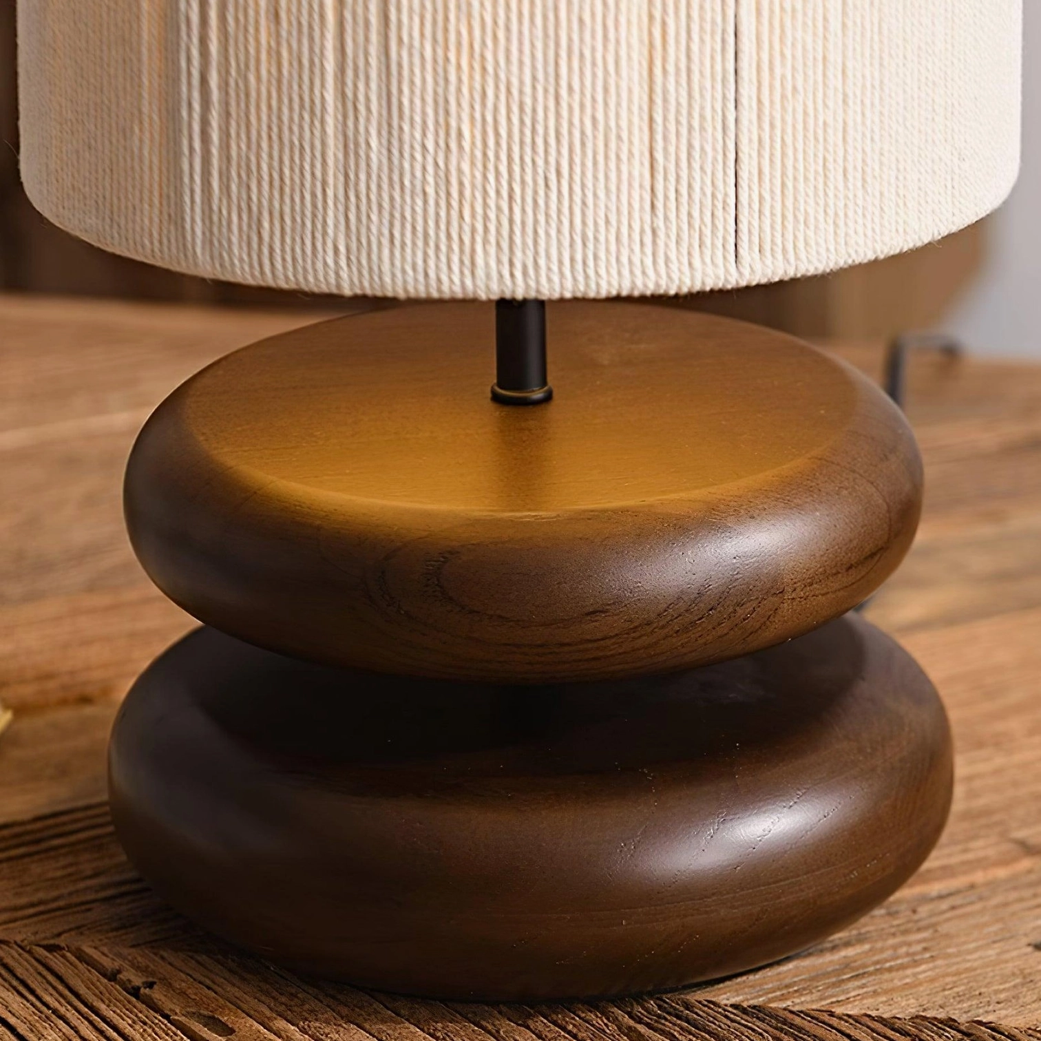 Warm wood table lamp providing soft diffused lighting in residential interior