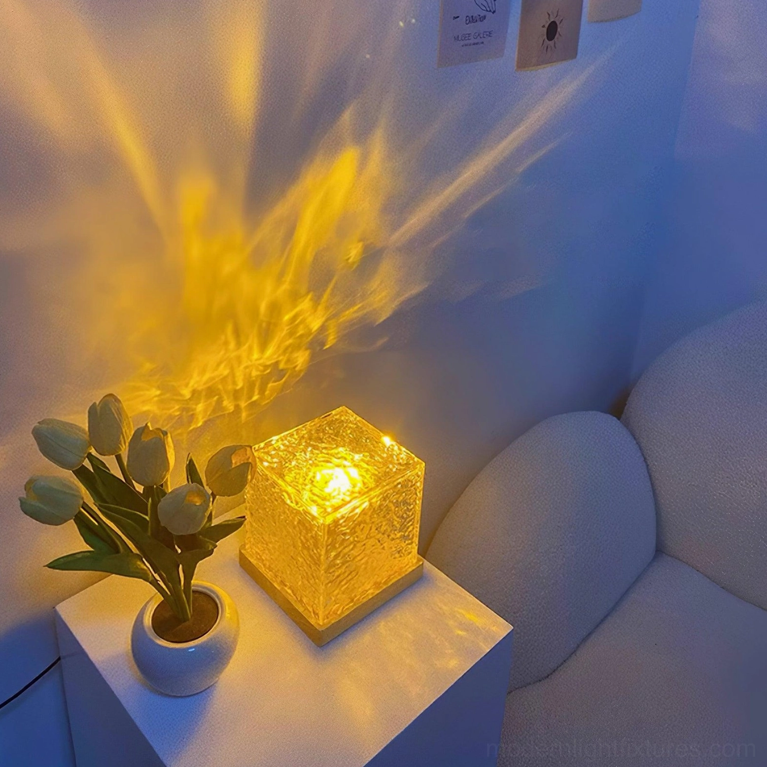 Water ripple crystal table lamp on home office desk providing focused cool white ambient lighting for work