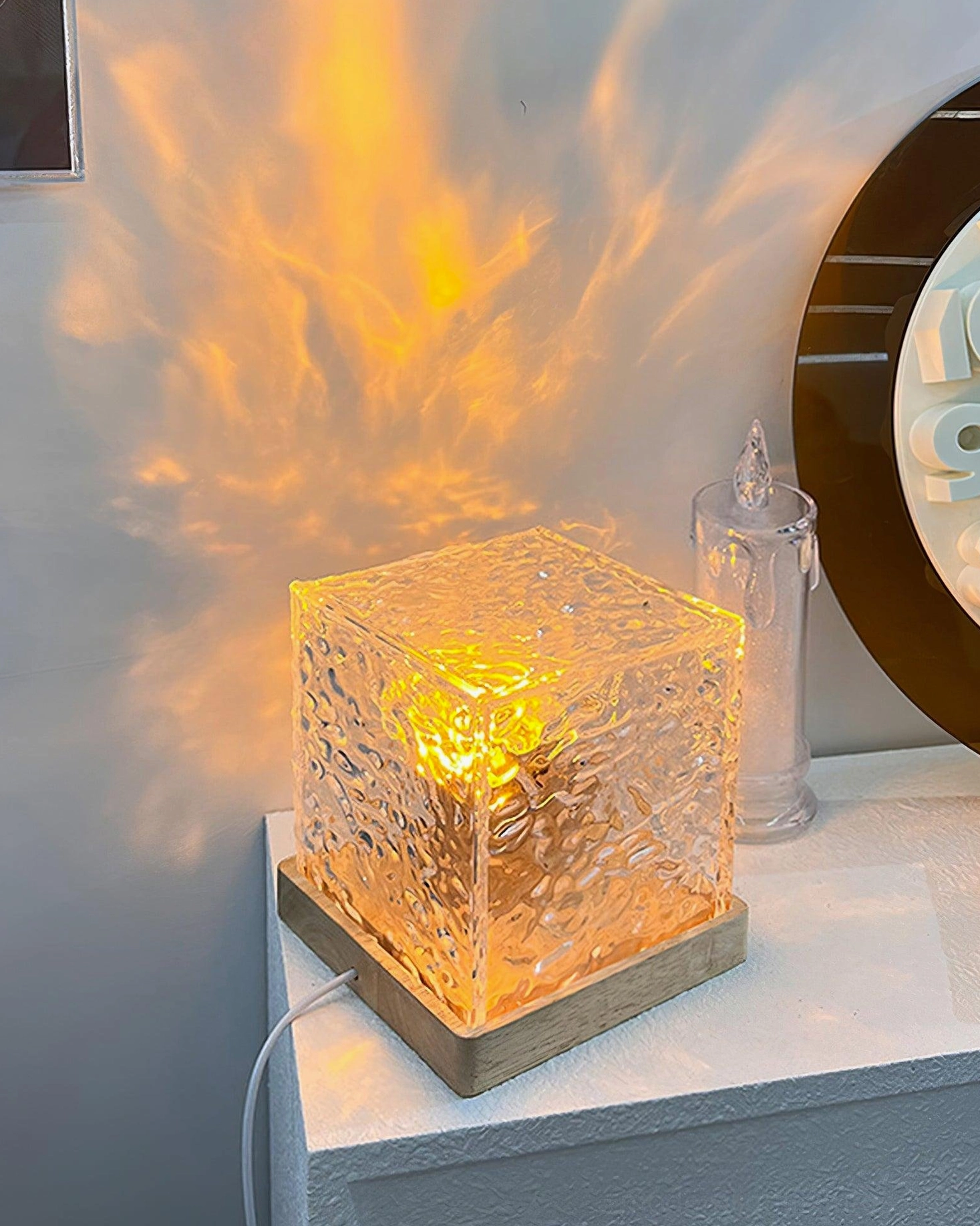 Decorative water ripple table lamp creating dynamic light art on wall, interactive ambient lighting piece for home