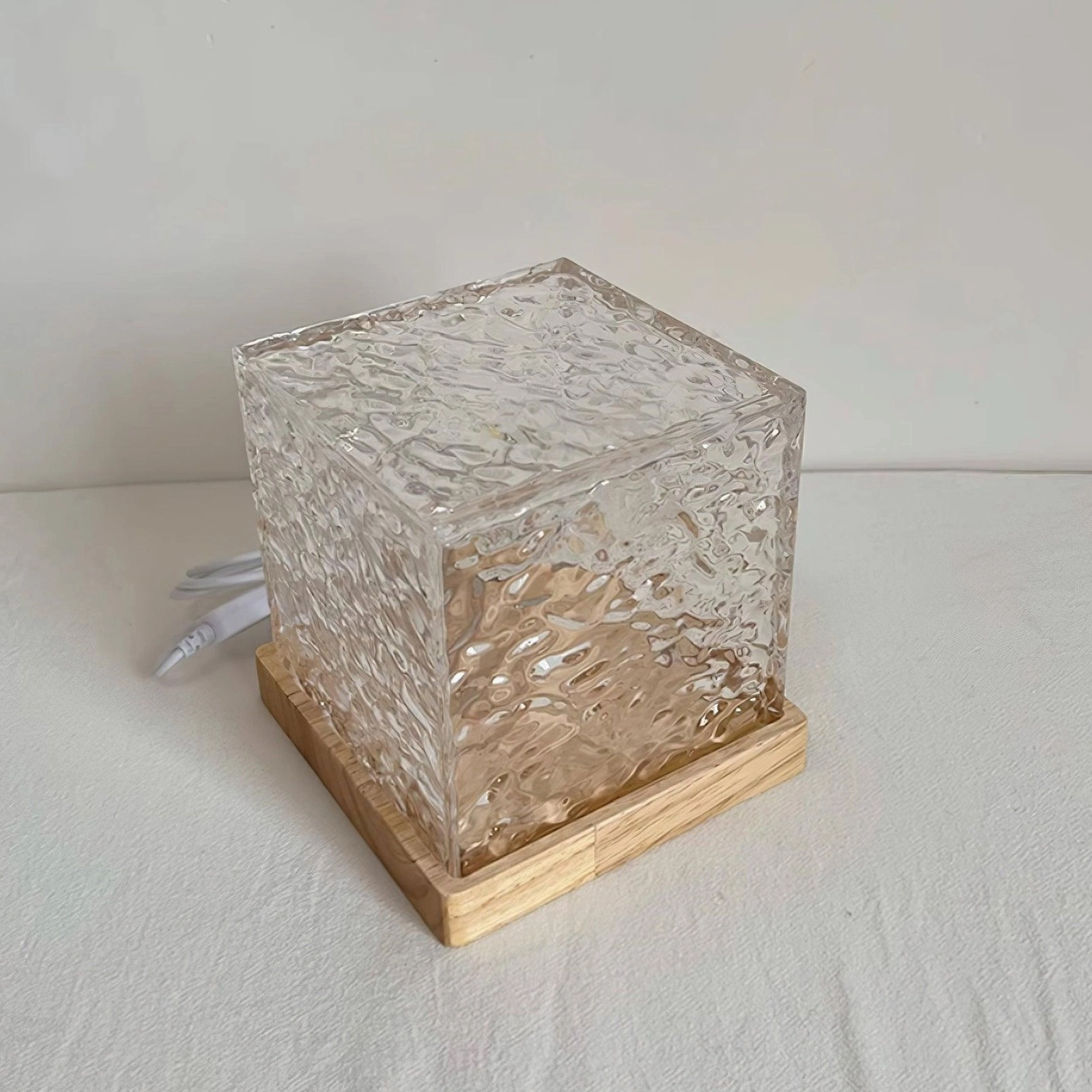 Water ripple table lamp with dynamic light refraction through textured glass, artistic modern table lamp accent piece