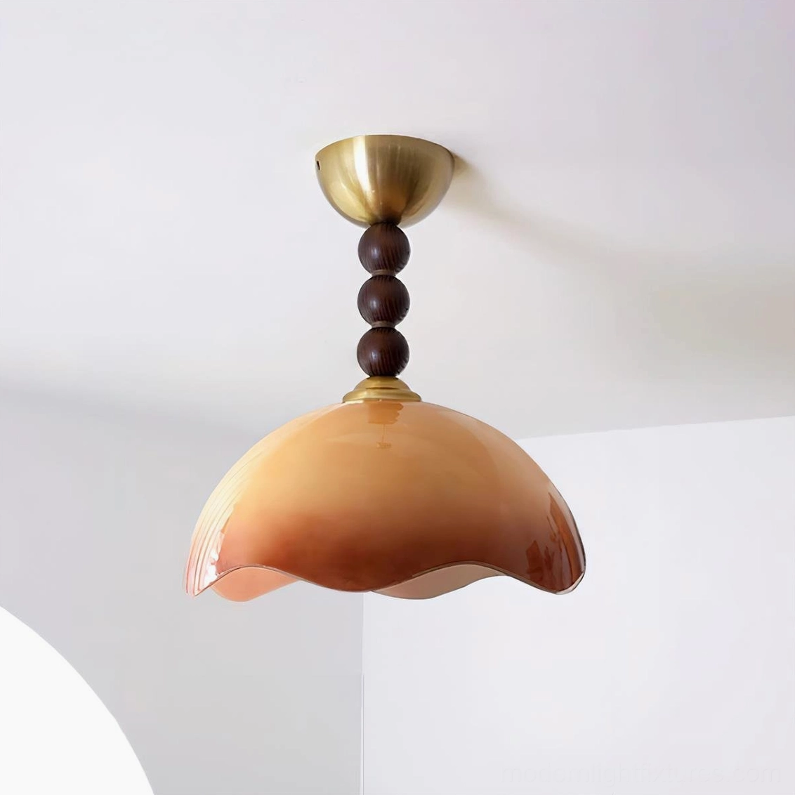 Caramel-tone Wave Coralia vintage ceiling light with gradient wavy glass dome and brass hardware detail
