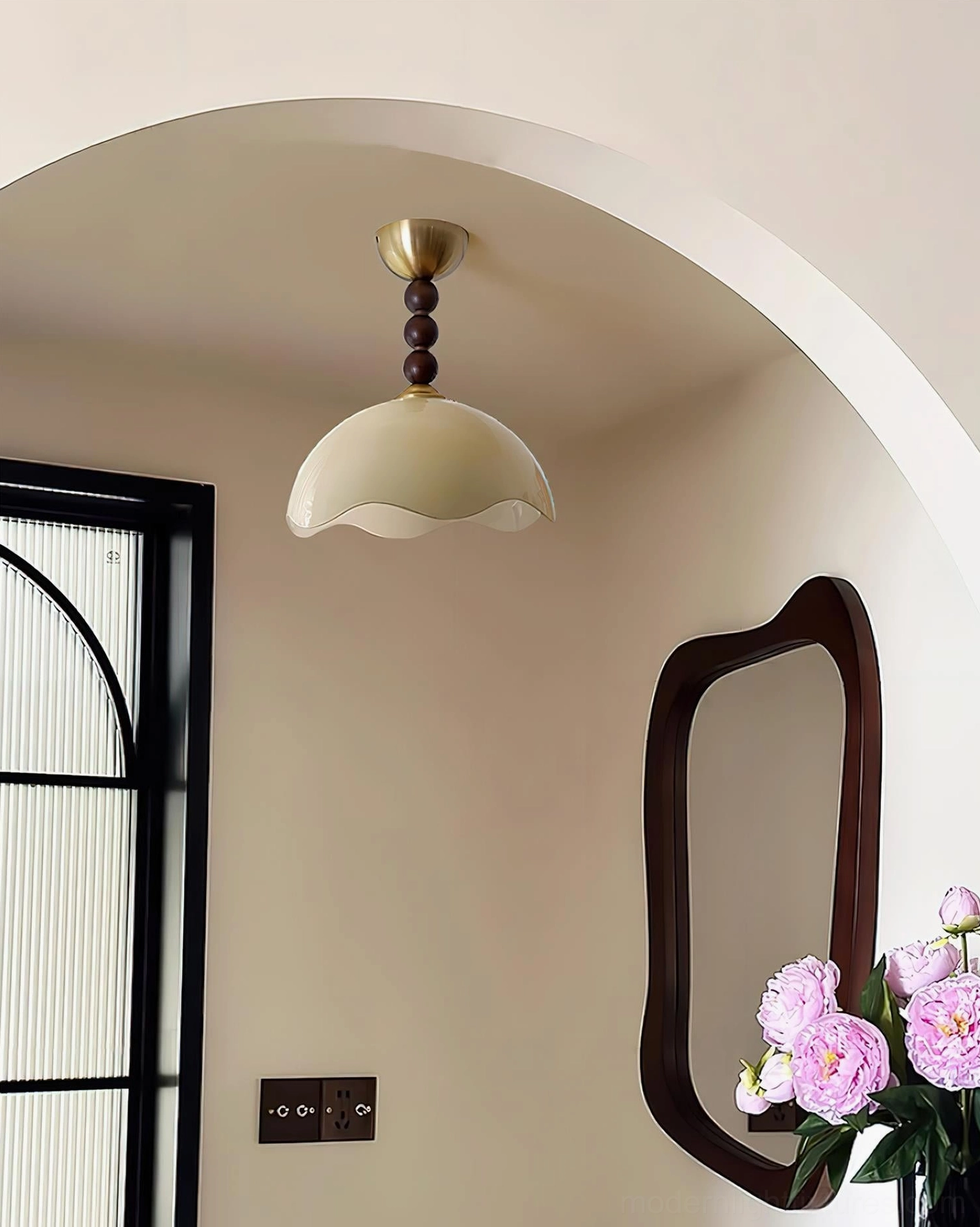 Wave Coralia semi-flush ceiling light showing wavy gradient glass dome and brass canopy mount