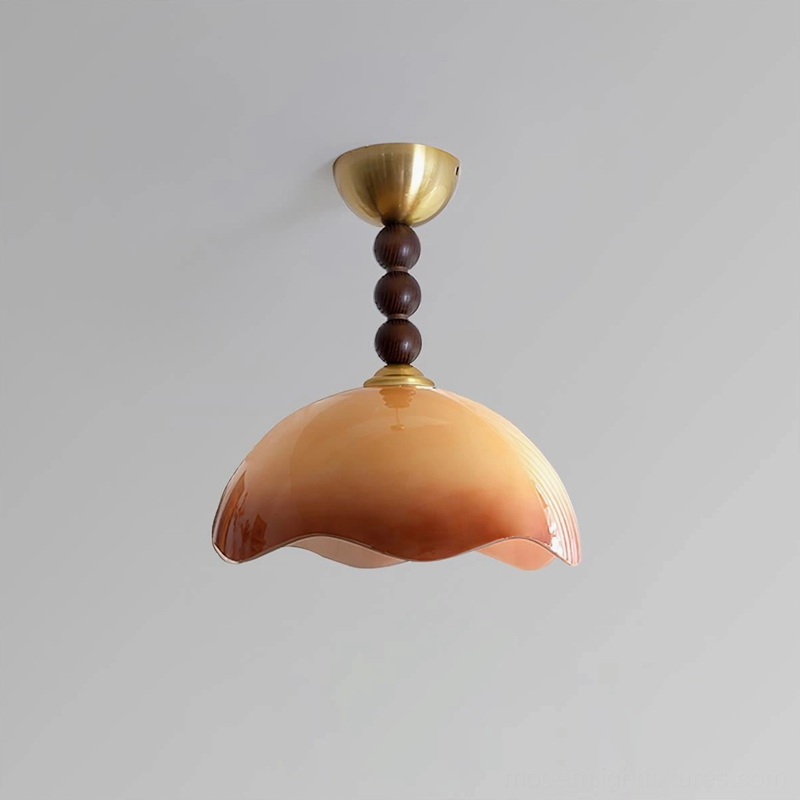 Vintage-style Wave Coralia semi-flush ceiling fixture showing wavy glass dome and metal hardware against neutral wall