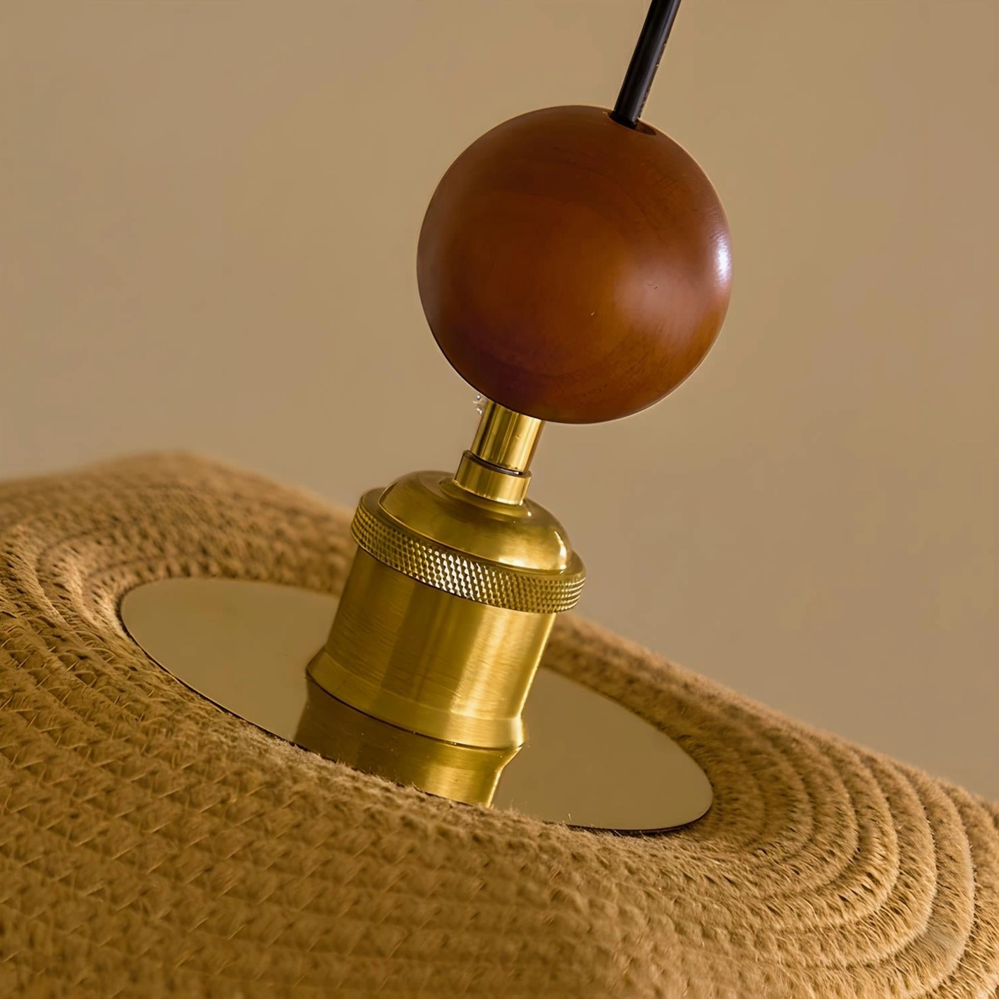 Wave pendant light creating focal point in styled contemporary living space with layered lighting