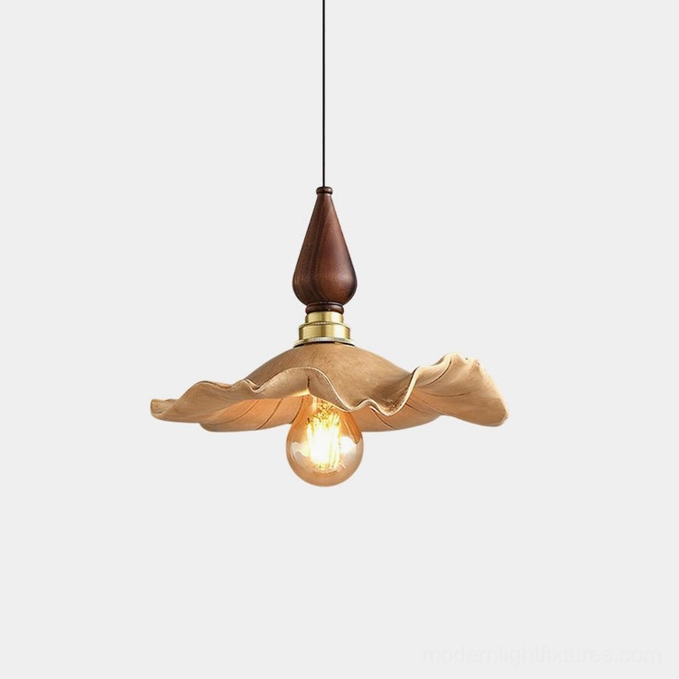 Wavely sculptural resin pendant light with wave-textured shade and walnut wood finial, front studio view