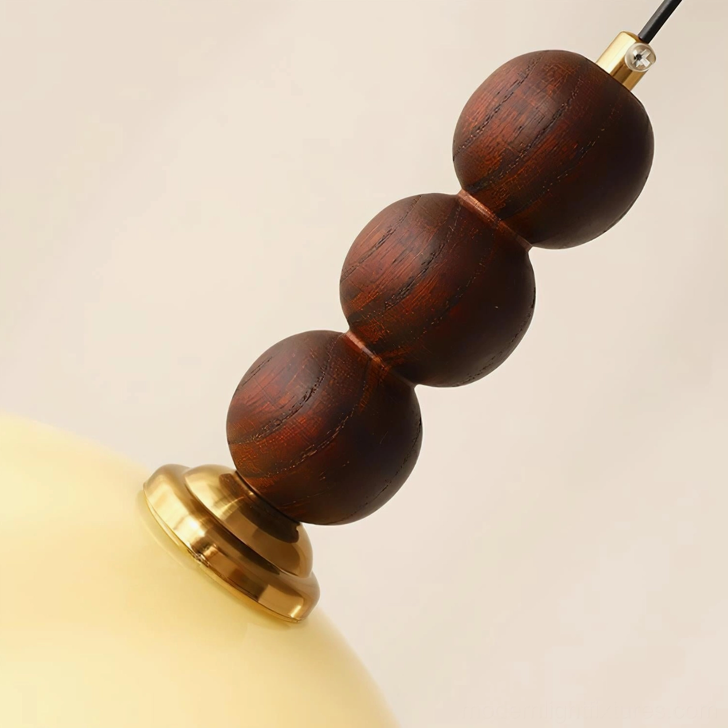 Wavy-edge rippled glass pendant light showing soft diffused downward glow and gentle shadow patterns